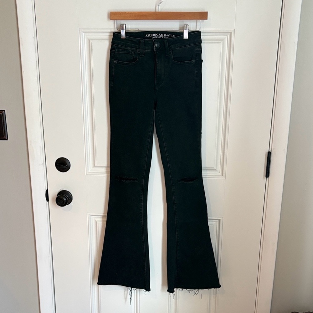 American Eagle Distressed Black Flare Jeans. Worn once. Purchased 7 years ago.